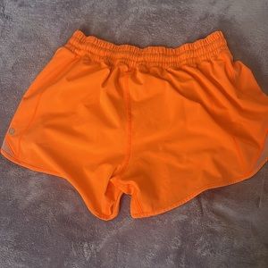 lululemon neon orange hotty hot tall shorts